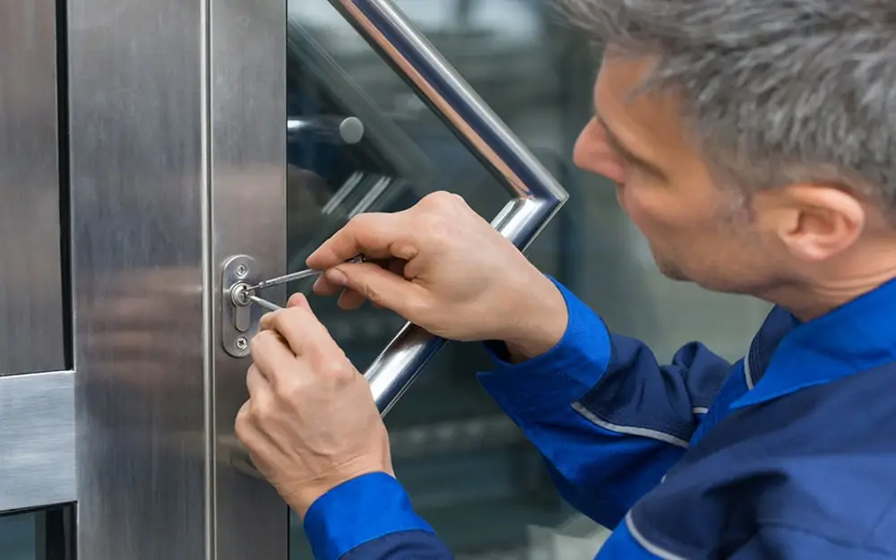 Exper commercial locksmith edmond unlocking the office door in downtown edmond.